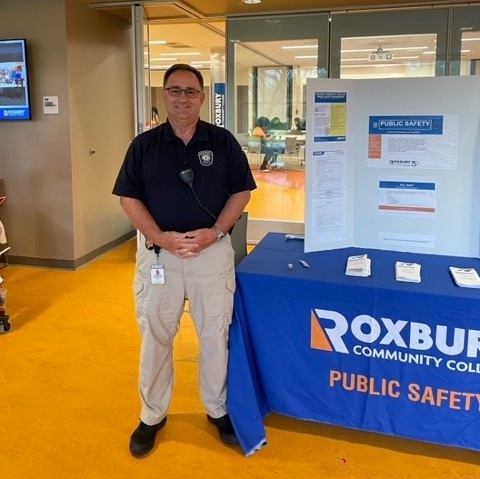 david albanese, director of public safety at informational table during open registration